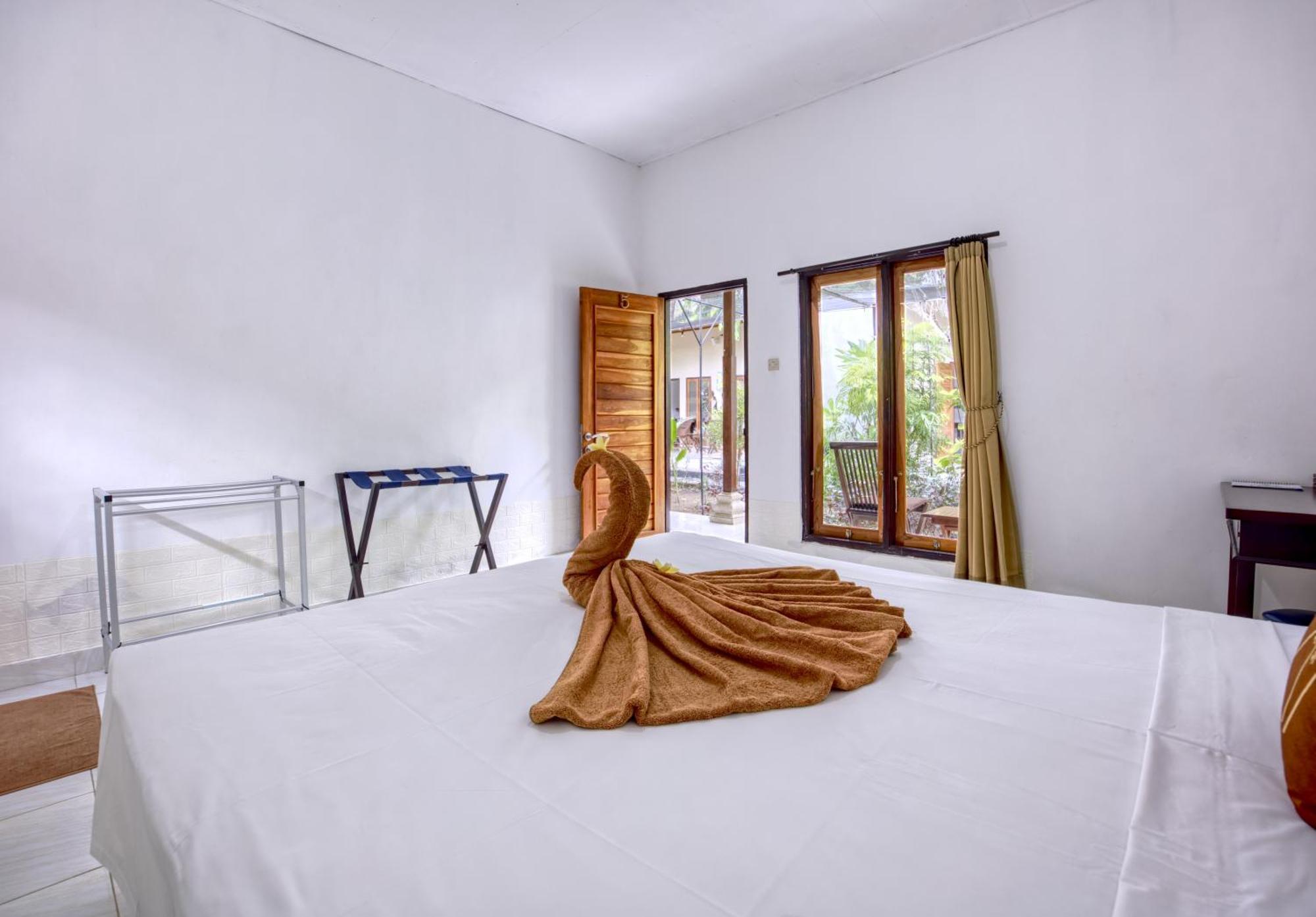 Ari La Casa Hotell Toyapakeh Rom bilde